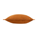 Side view of the Holmfirth Canvas Plain Cotton Cushion in pecan orange, showing its plump square shape and piped edge trim on a plain white background.