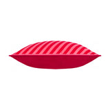 Rectangular velvet bolster cushion in red and pink diagonal stripe pattern on the front, plain solid red velvet reverse, shown side-on against a white background.