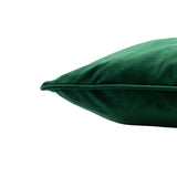 Close-up of the Hortus Animal Velvet Cushion in emerald, showing the plush green velvet fabric and piped edge detail against a plain white background.