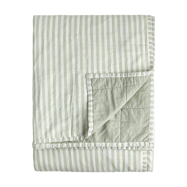 Hebden Percale Cotton Bedspread in Eucalyptus/Bay Green, folded to show reversible green-and-white striped side and plain tonal green quilted side, on a white background.