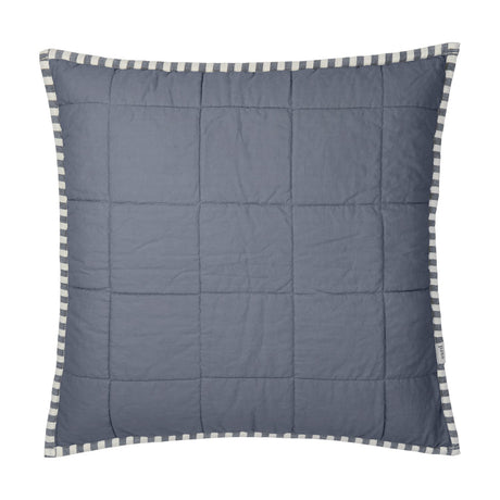Hebden Percale Cotton Cushion in denim blue with a quilted grid pattern and a navy and cream striped edge trim, shown on a white background.