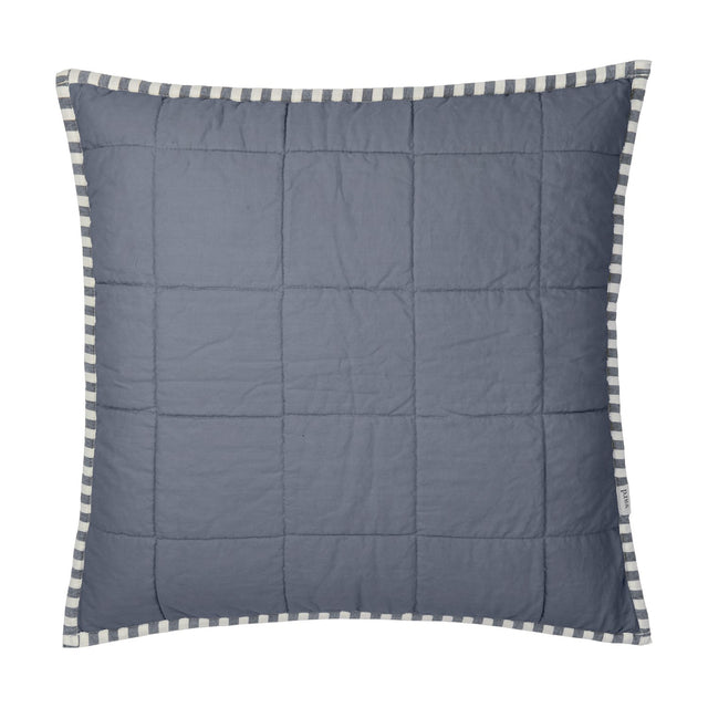 Hebden Percale Cotton Cushion in denim blue with a quilted grid pattern and a navy and cream striped edge trim, shown on a white background.