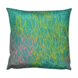 Reverse side of the Hummingbird Floral Polyester Cushion, showing a graphic leaf pattern in teal, yellow, green and coral-pink, set on a plain white background.