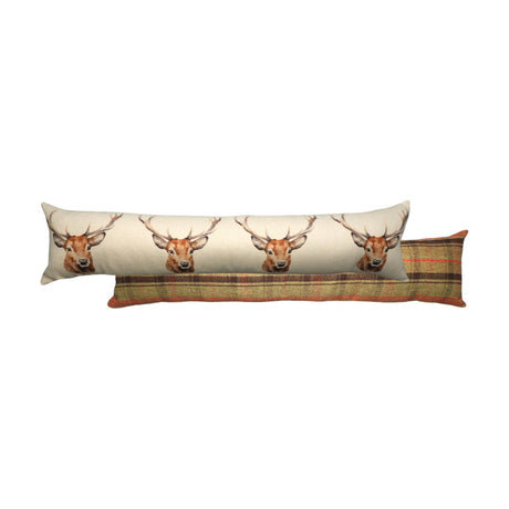 Bolster-shaped draught excluder with cream linen front featuring watercolour stag heads in brown and rust, backed with green and orange tartan fabric.