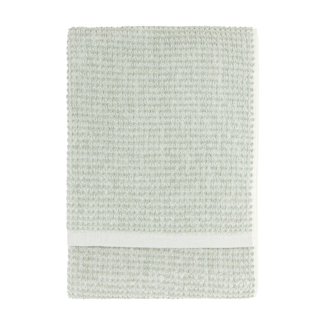 Hebden Plain Cotton Towel in Bay Green, folded flat with a textured waffle weave and off-white contrast border, shown on a plain white background.