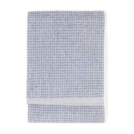 Hebden Plain Cotton Towel in denim blue, folded flat with a waffle-weave texture and plain woven border, shown on a white background.