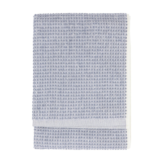 Hebden Plain Cotton Towel in denim blue, folded flat with a waffle-weave texture and plain woven border, shown on a white background.