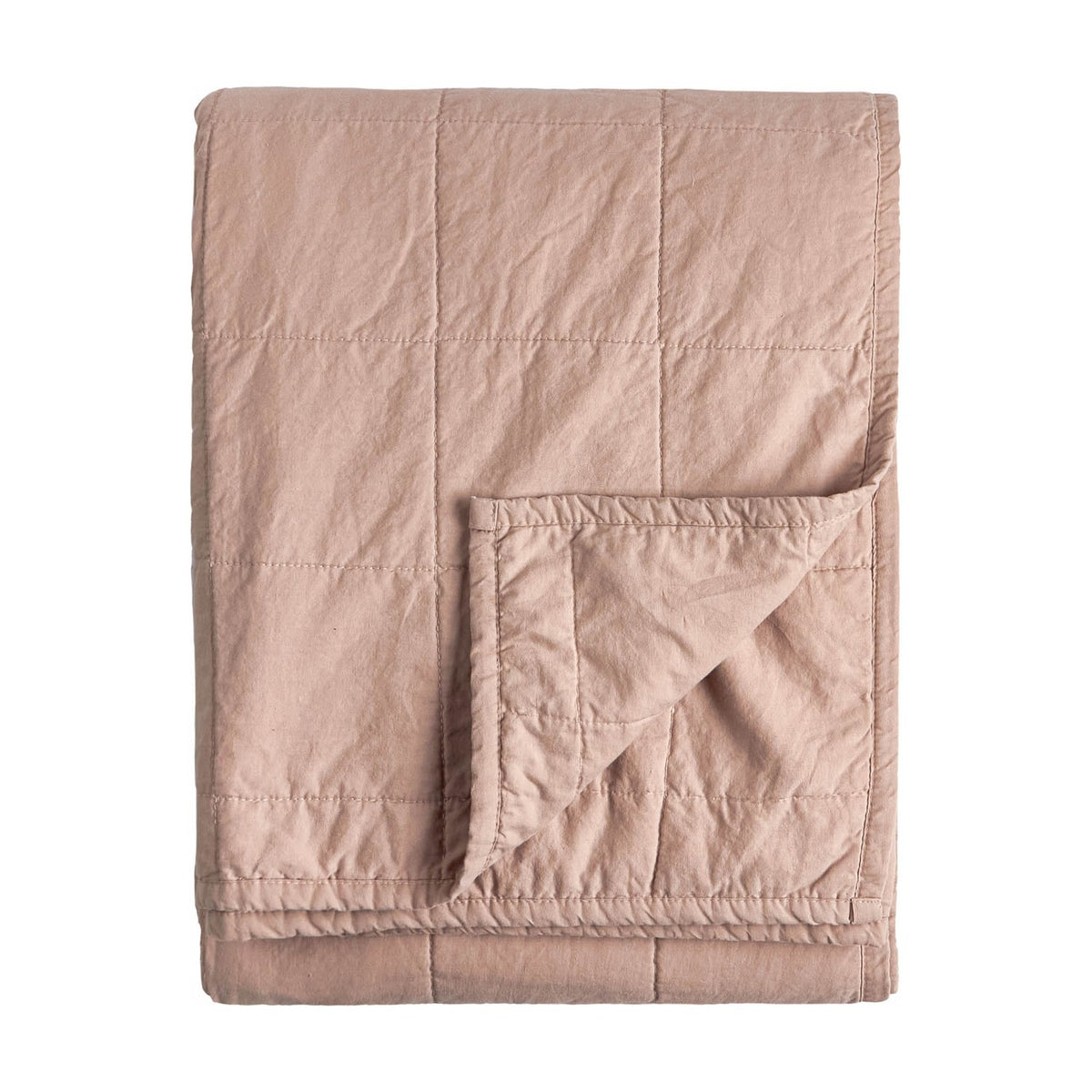 Folded Hebden quilted cotton percale bedspread in warm pink (Cotta), showing a grid-stitched face and reverse corner fold, on a plain white background.