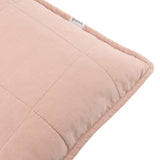 Close-up of the Hebden Percale Cotton Cushion in Cotta, showing the pink 100% cotton fabric quilted into a grid with a slim Oxford border, on a white background.