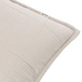 Close-up of the Hebden Percale Cotton Cushion in stone, showing quilted grid stitching, cotton fabric texture, and a corner label, on a white background.