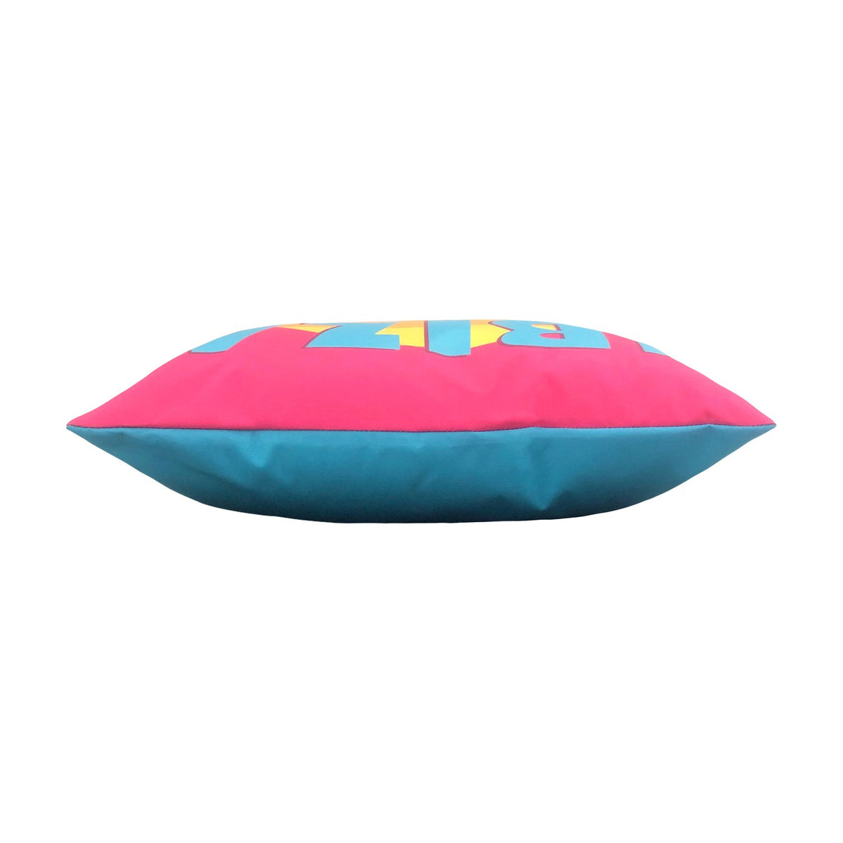 Side view of the Ibiza Abstract Polyester Cushion showing its box edge, with pink and blue panels and a hint of yellow graphic detail, on a plain white background.