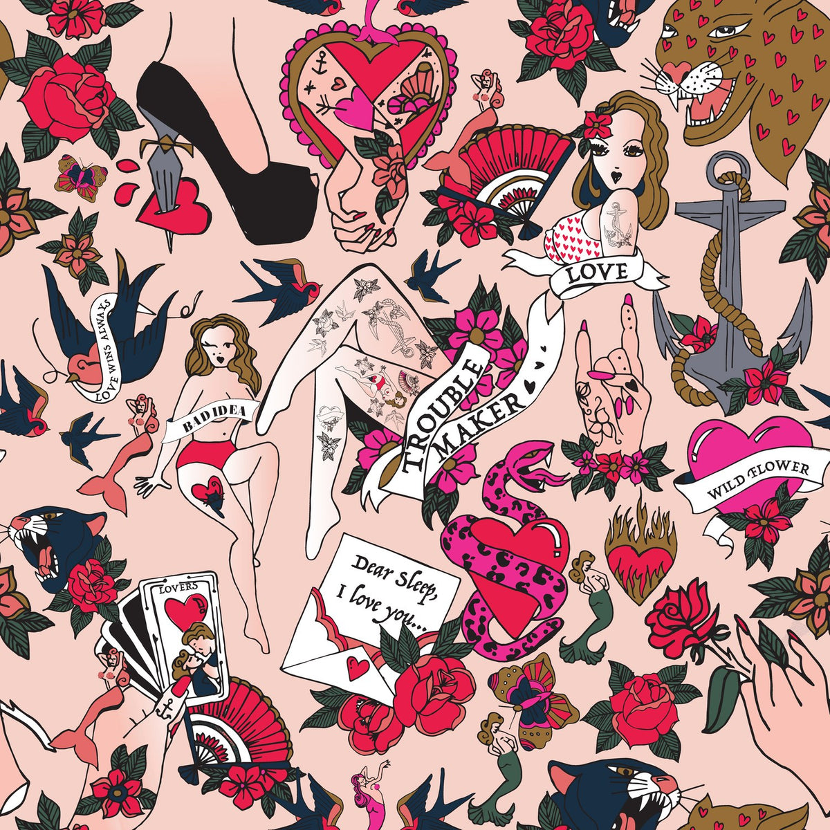 Inked Reversible Abstract Duvet Cover Set in blush, featuring a tattoo-style print with red hearts, roses, pin-up figures and banners reading Trouble Maker and Wild Flower.