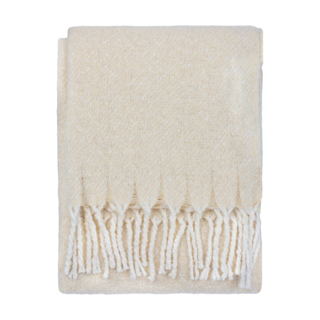 Isla Plain Polyester Throw in cream, folded to show its woven texture and twisted tassel fringe, set against a plain white background.
