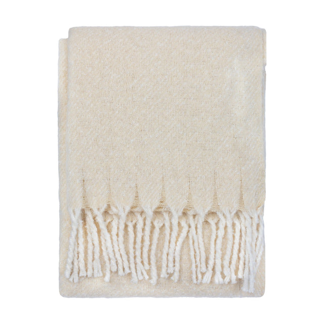 Isla Plain Polyester Throw in cream, folded to show its woven texture and twisted tassel fringe, set against a plain white background.