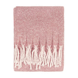 Isla Plain Polyester Throw in Heather, a folded dusky pink blanket with a heathered flecked weave and white tasselled fringe, shown on a plain white background.