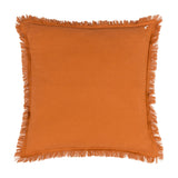 Jaye Velvet Cotton Cushion in rust orange, square shape with fringed trim along all four edges, shown on a plain white background.