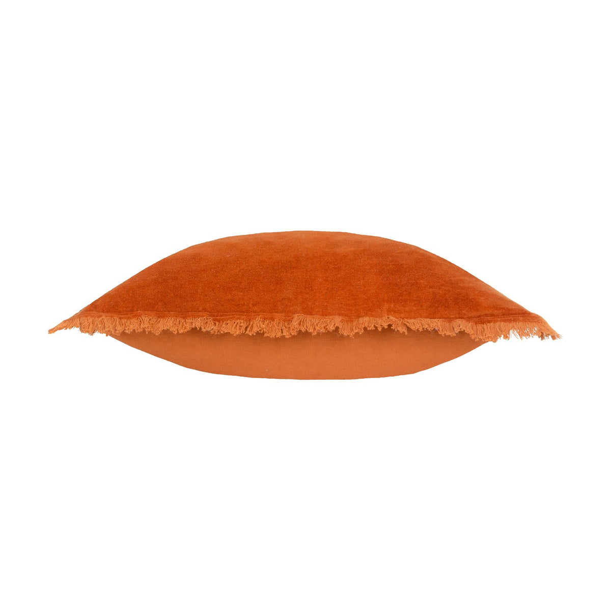 Jaye Velvet Cotton Cushion in rust orange, shown side-on with fringed edge trim and plain cotton reverse, set against a white background.