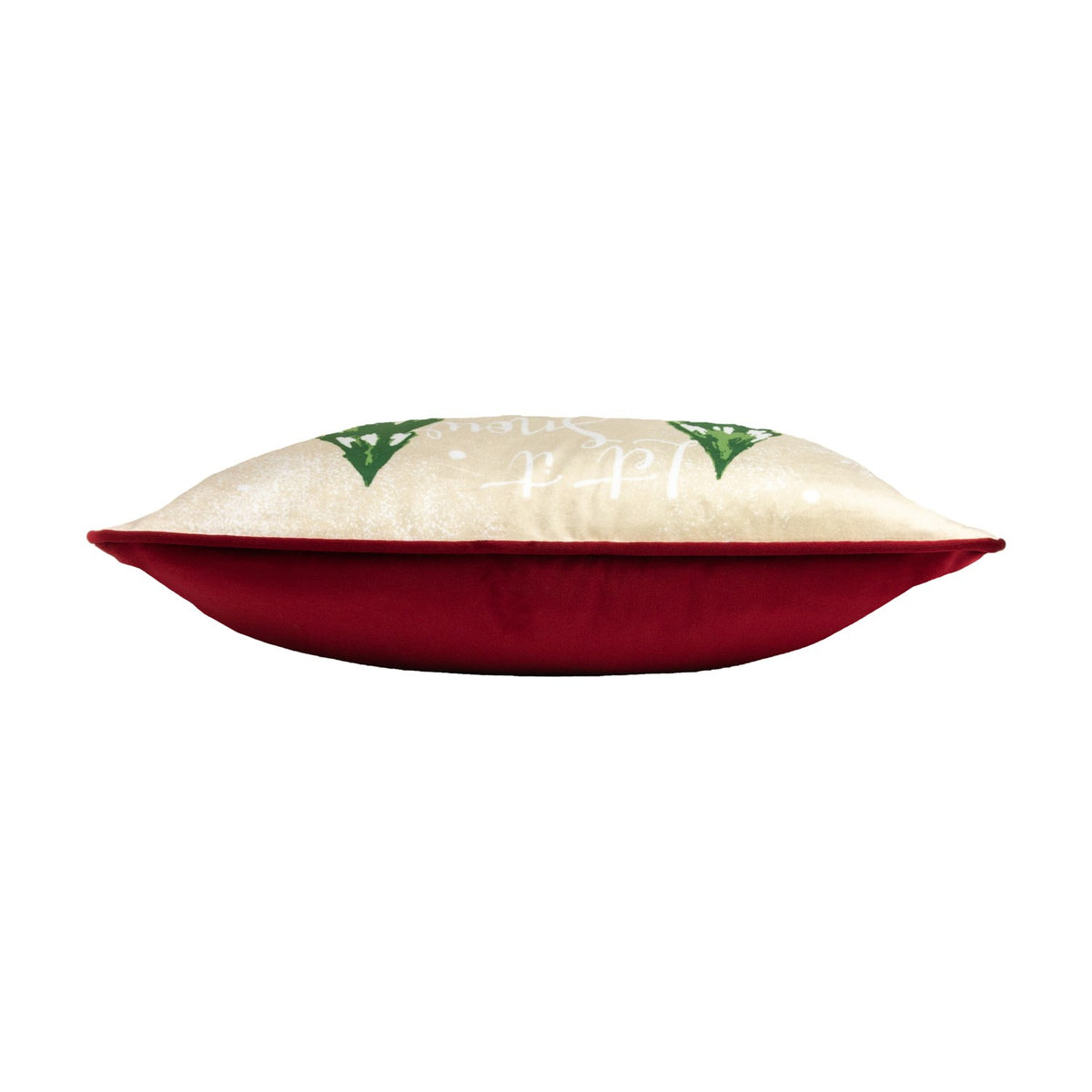 Side view of the Jolly Santa velvet cushion showing a plain red velvet back and cream printed front with green tree motifs, on a white background.
