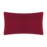 Rectangular velvet cushion in plain deep berry red, shown from the back with matching piped edge trim, photographed on a plain white background.
