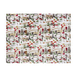 Joy To All printed polyester fleece throw in cream, featuring a festive city scene with skylines, trees, taxis and skaters in red, green and brown tones.