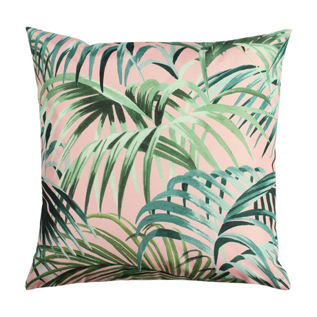 Square Jungle Reversible Polyester Cushion in blush pink with green tropical palm leaf print, shown on a plain white background.
