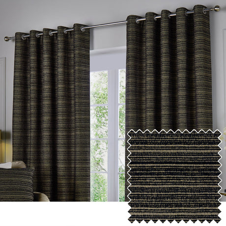 Jupiter Chenille eyelet curtains in black and gold hung on a chrome pole beside a window, with a fabric swatch showing the fine striped weave.