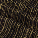 Close-up of the Jupiter chenille eyelet curtain fabric in black with fine horizontal gold thread detailing, showing a soft ribbed jacquard texture.