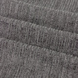 Close-up of Jupiter chenille jacquard fabric in graphite, showing ribbed horizontal texture with fine pearlescent threads woven through the fully lined eyelet curtain panel.