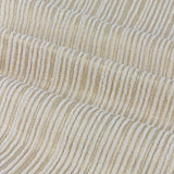 Close-up of Jupiter Chenille Fully Lined Eyelet Curtains in ivory and gold, showing fine horizontal woven texture with subtle metallic threading across draped folds.