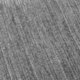 Close-up of the Jupiter Jacquard Chenille Cushion in graphite, showing ridged chenille fabric with silver-grey fibres creating a linear textured pattern.