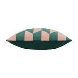 Kalho Jacquard Velvet Cushion in pink and green, shown side-on to reveal its plump bolster-like shape with a geometric patterned edge above a plain green velvet base, set against a white background.