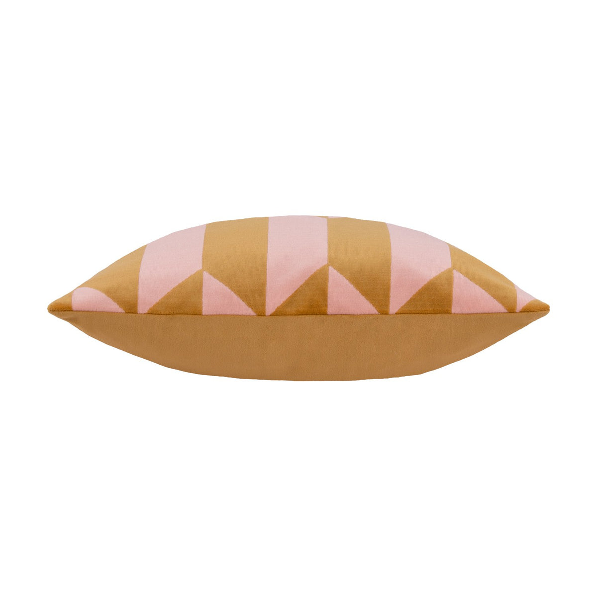 Kalho jacquard velvet cushion shown side-on, revealing its plump shape with pink and ochre triangular pattern on the front and solid ochre back, set against a plain white background.