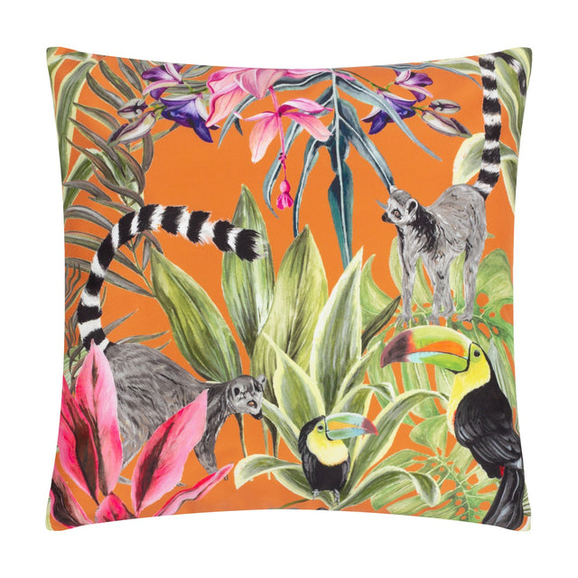 Kali Animals square polyester cushion with an orange jungle print featuring lemurs, toucans, green foliage, and pink and purple tropical flowers.