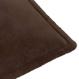 Close-up of the Kallu Plain Faux Fur Cushion in chocolate brown, showing dense fur pile and a stitched edge seam, on a plain white background.