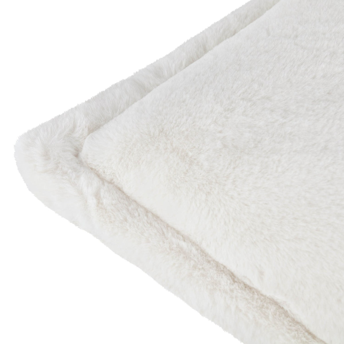 Close-up of the Kallu Reversible Faux Fur Cushion in ecru, showing the deep pile texture and folded Oxford flange border edge against a white background.