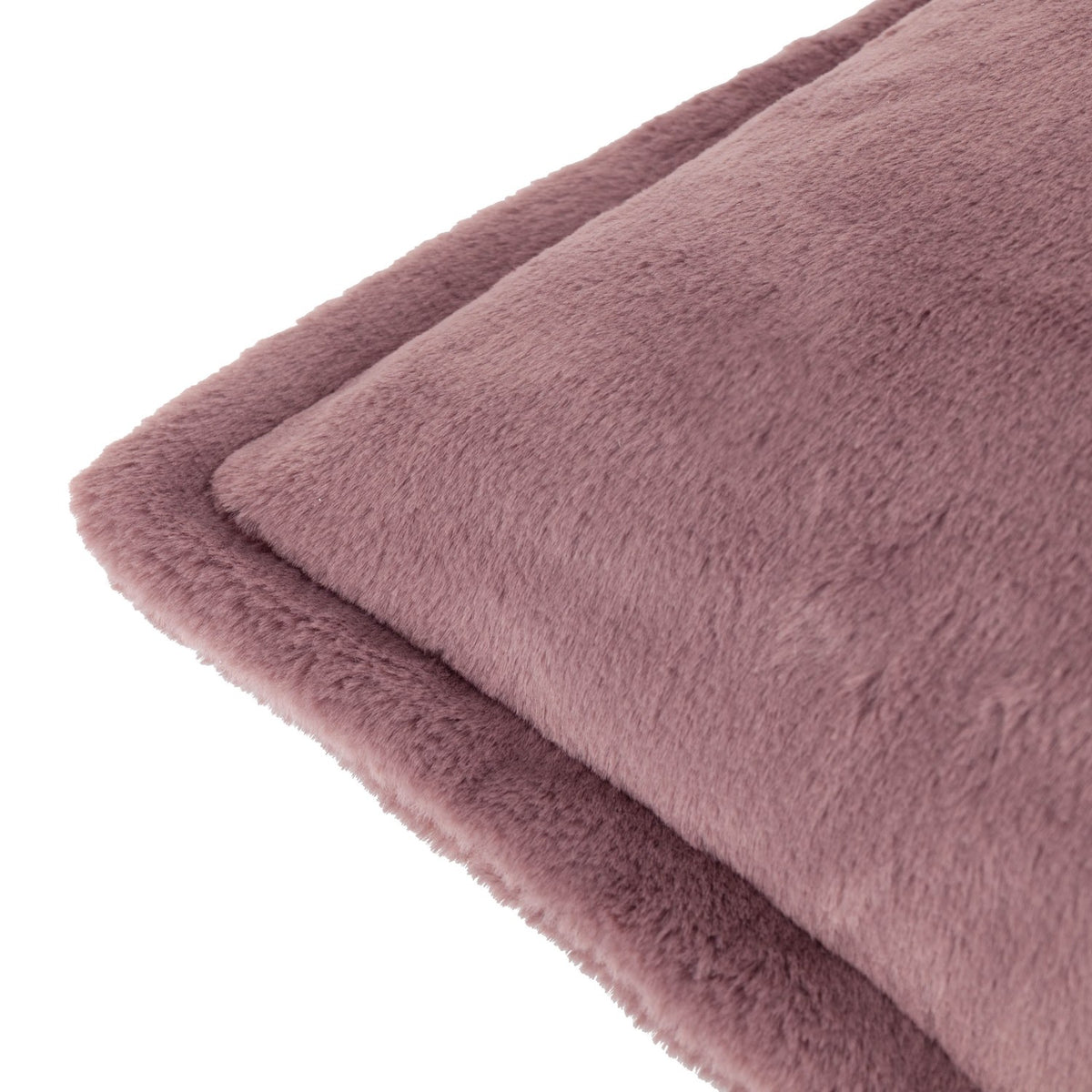 Close-up of the Kallu Reversible Faux Fur Cushion in mulberry, showing dense brushed pile on both sides and a flat Oxford flange border, on a white background.