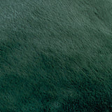 Close-up of the Kallu Plain Faux Fur Cushion in needle green, showing the plush polyester pile texture with subtle tonal shading.
