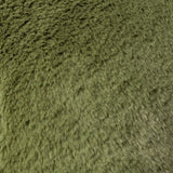 Close-up of the Kallu Reversible Faux Fur Cushion in olive green, showing its dense, plush pile texture with subtle light and shade variation.