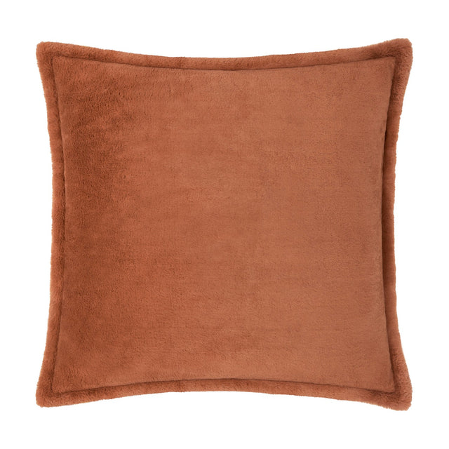 Kallu Reversible Faux Fur Cushion in rust orange, square with a flanged edge and dense plush pile on both sides, shown on a plain white background.