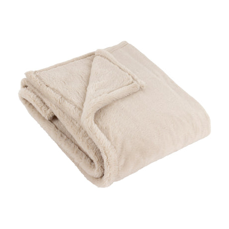 Kallu Reversible Faux Fur Throw in natural, folded to show its double-sided fur texture, photographed against a plain white background.