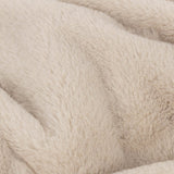 Close-up of the Kallu Reversible Faux Fur Throw in natural, showing soft, dense faux fur texture in a light beige tone.