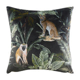 Kibale Jungle polyester cushion, square 43 x 43cm, with a printed tropical scene of a leopard and monkey among green foliage on a black ground, shown on a white background.