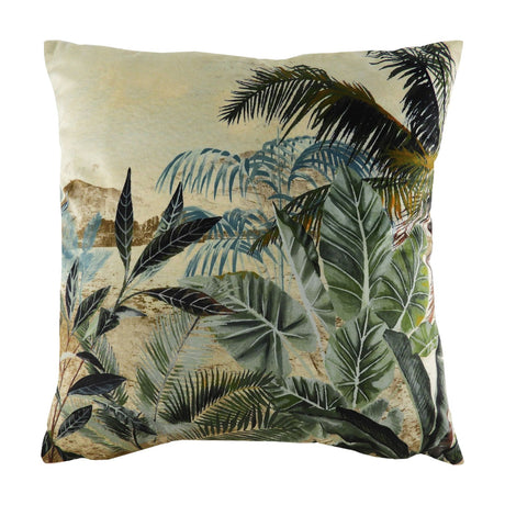 Kibale Jungle square polyester cushion, 43 x 43cm, with a printed tropical scene of green leaves and palm fronds over a faded sandy landscape, shown on a white background.