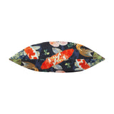 Koi Pond Reversible Polyester Cushion in Midnight, shown edge-on displaying orange and white koi carp, lily pads and greenery on a dark navy ground, against a plain white background.