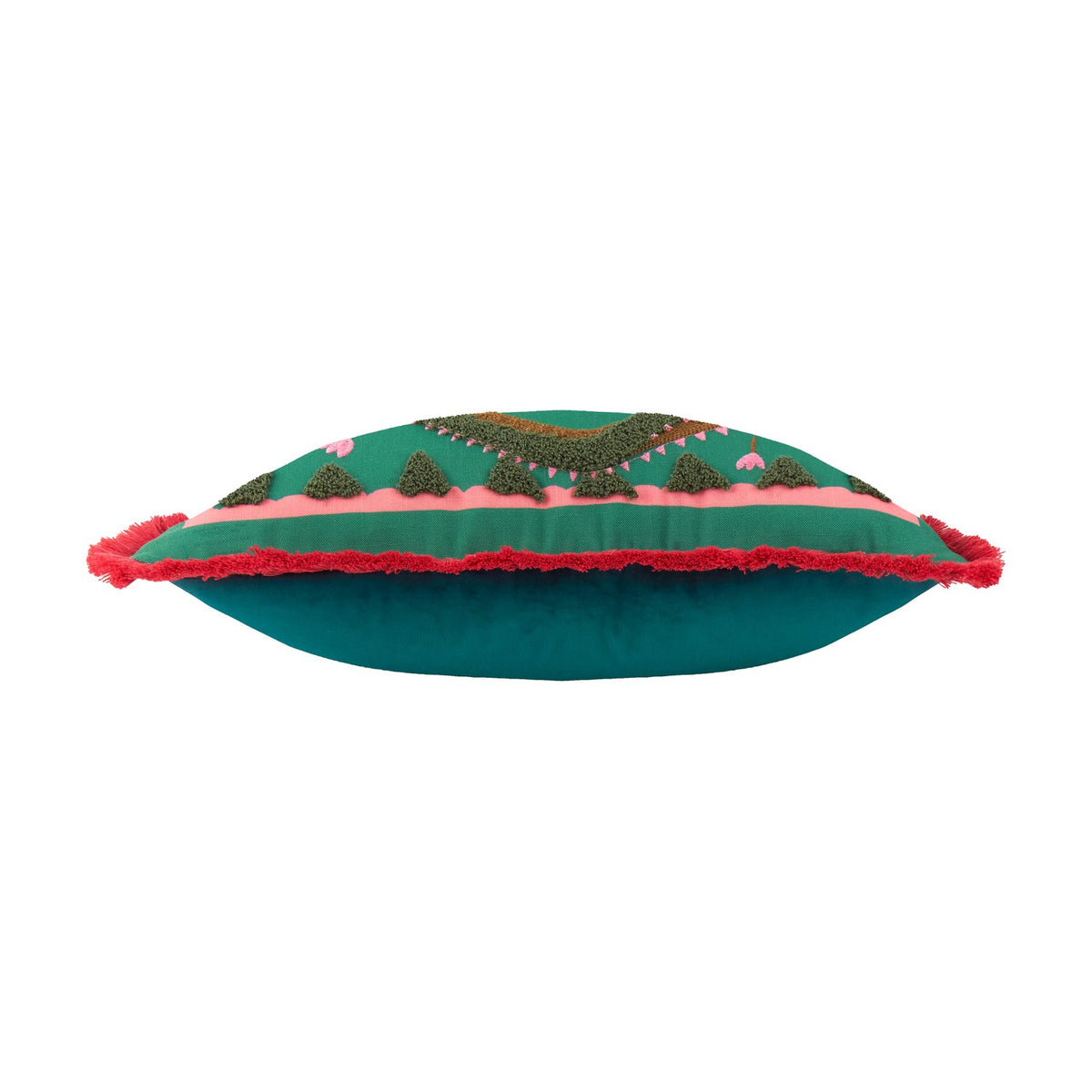 Les Animaux Croc Monsieur cushion shown side-on, teal fabric with tufted crocodile embroidery, pink floral accents, coral fringe trim, and teal velvet reverse, on a white background.