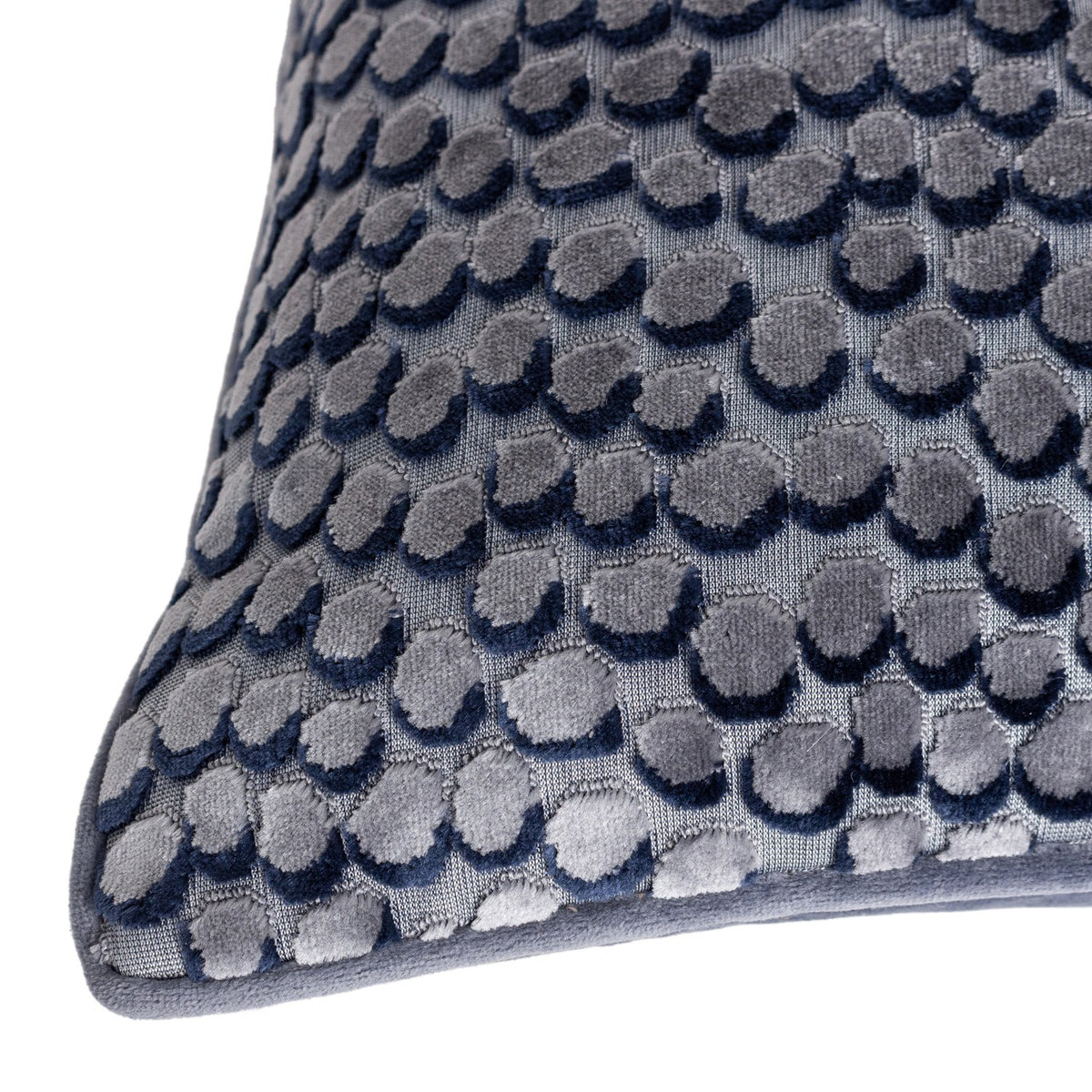 Lanzo Abstract Velvet Cushion in Dusk, close-up of grey and navy cut-velvet circular pattern with piped edge, shown on a plain white background.