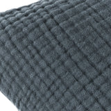 Close-up of the Lark Reversible Cotton Cushion in Dusk, showing the four-layer muslin crinkle cotton's ribbed, waffle-textured surface in muted blue-grey.