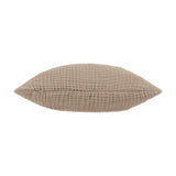 Lark Plain Cotton Cushion in mole brown, shown side-on to reveal its plump, crinkled muslin texture and centre seam, set against a plain white background.