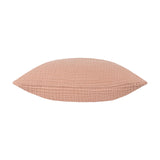 Lark Reversible Cotton Cushion in Pink Clay, shown side-on with a crinkled four-layer muslin texture, on a plain white background.