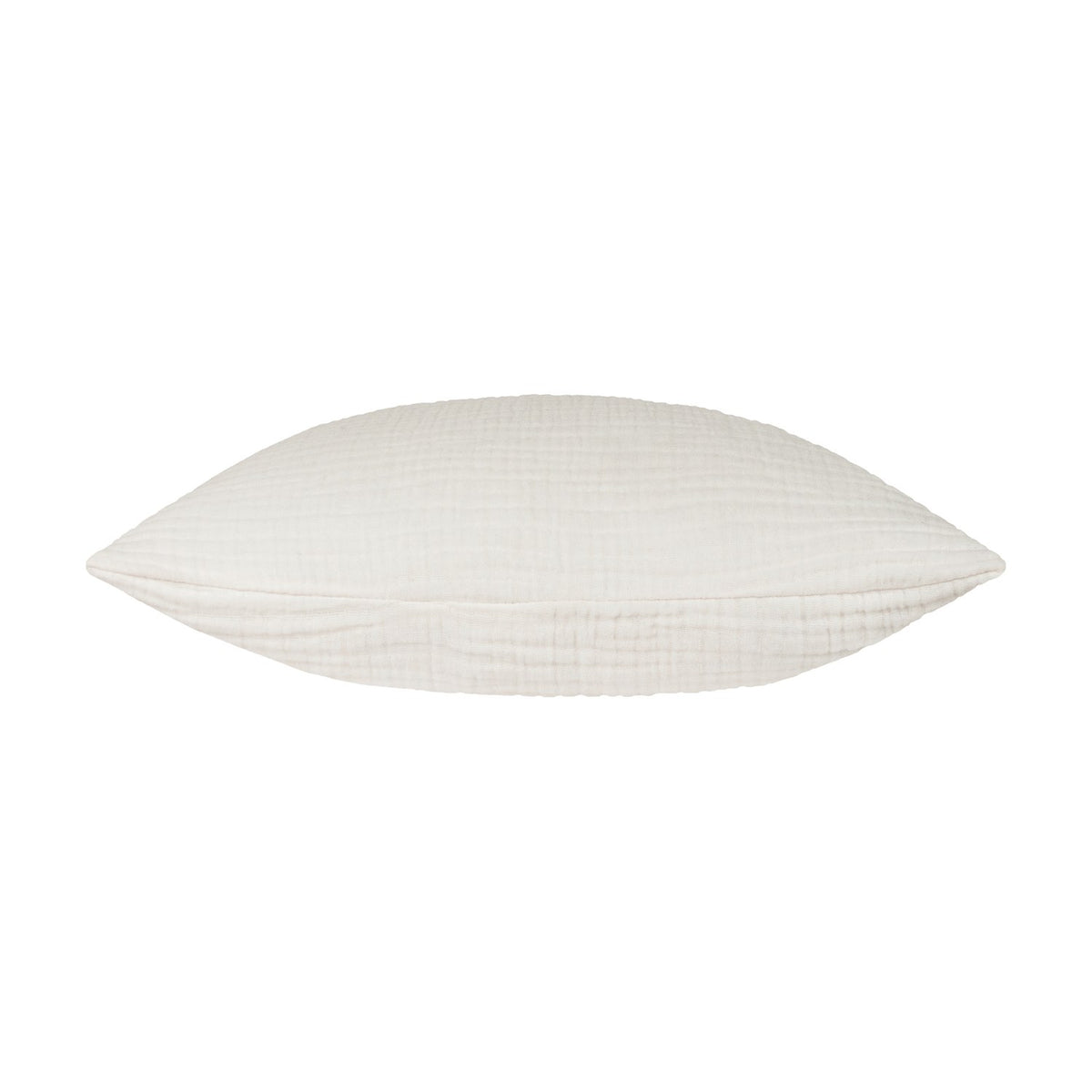Lark Reversible Cotton Cushion in white, shown side-on to reveal its plump, textured muslin crinkle cotton surface, set against a plain white background.